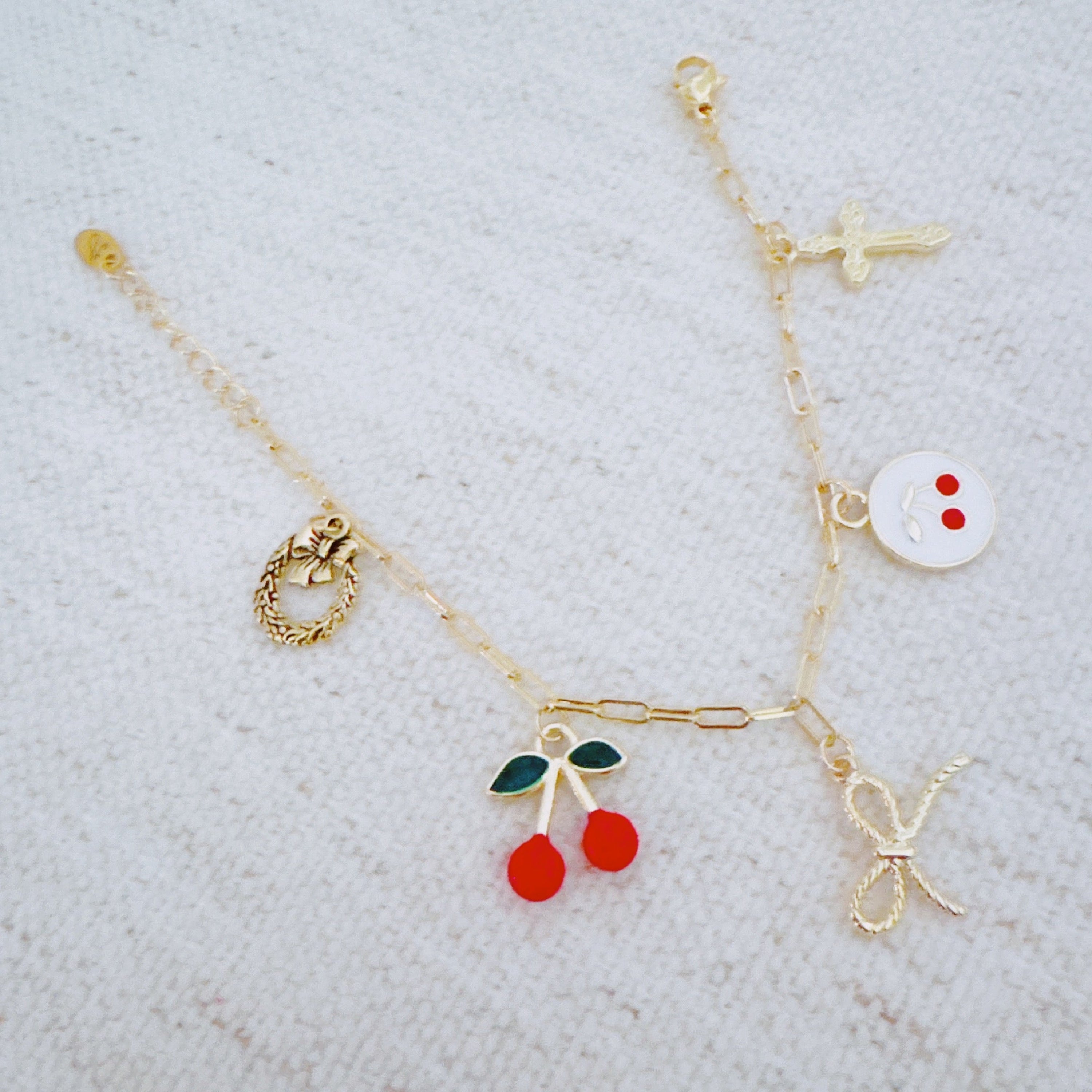 Cherry Chic Charm Bracelet – Bow, Cross & More